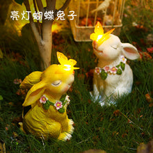 Load image into Gallery viewer, Solar Rabbit Garden Statues Garden Decor Bunny Holding a Butterfly Solar Light