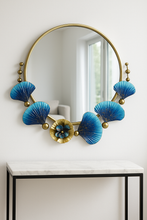 Load image into Gallery viewer, Blue and gold floral round wall mirror on luxury living room wall