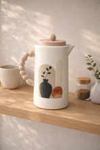 Load image into Gallery viewer, Minimal Nordic insulated flask with beaded handle and pastel lid on wooden shelf