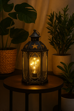 Load image into Gallery viewer, Image Alt Text: Star-cut retro lantern lamp with warm glowing bulb for vintage home decor