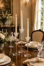 Load image into Gallery viewer, Diamond Glow 3-piece crystal candle holder set with rose-gold stems and faceted crystal cups on dining table