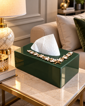 Load image into Gallery viewer, Emerald green decorative glass tissue box styled beside a lamp and books