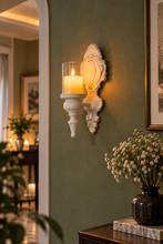 Load image into Gallery viewer, Ivory vintage ornate wall candle sconce with clear glass hurricane on accent wall, MetaphorBD