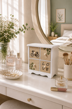 Load image into Gallery viewer, White and wood-tone 4-drawer decorative mini organizer cabinet with botanical, bicycle and LOVE designs, 9.5 × 9 × 4.5 inches.