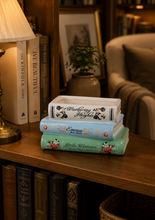 Load image into Gallery viewer, Decorative vintage book stack storage box inspired by classic novels for coffee table and bookshelf décor.