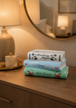 Load image into Gallery viewer, Decorative vintage book stack storage box inspired by classic novels for coffee table and bookshelf décor.