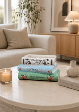 Load image into Gallery viewer, Decorative vintage book stack storage box inspired by classic novels for coffee table and bookshelf décor.
