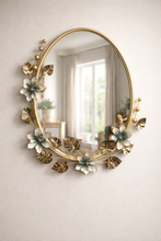 Load image into Gallery viewer, Floral round wall mirror with gold frame and decorative flower accents, 29 inch height and 22 inch width1