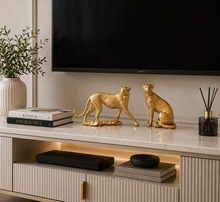 Load image into Gallery viewer, Luxury golden resin cheetah figurine pair on modern TV console table decora