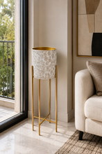 Load image into Gallery viewer, Luxury white embossed metal planter with gold interior and gold metal stand for indoor home décor.
