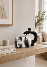 Load image into Gallery viewer, Modern abstract ceramic vase set with black sculptural vase and black white striped decorative vase for contemporary home décor