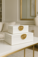 Load image into Gallery viewer, Modern glass storage box set with gold handle detailing. Premium home decor piece for dressing tables, consoles & gifting. Two sizes available.