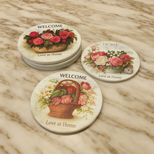 Load image into Gallery viewer, Round wooden heat pads with vintage floral designs – 6 piece set – MetaphorBD kitchen decor