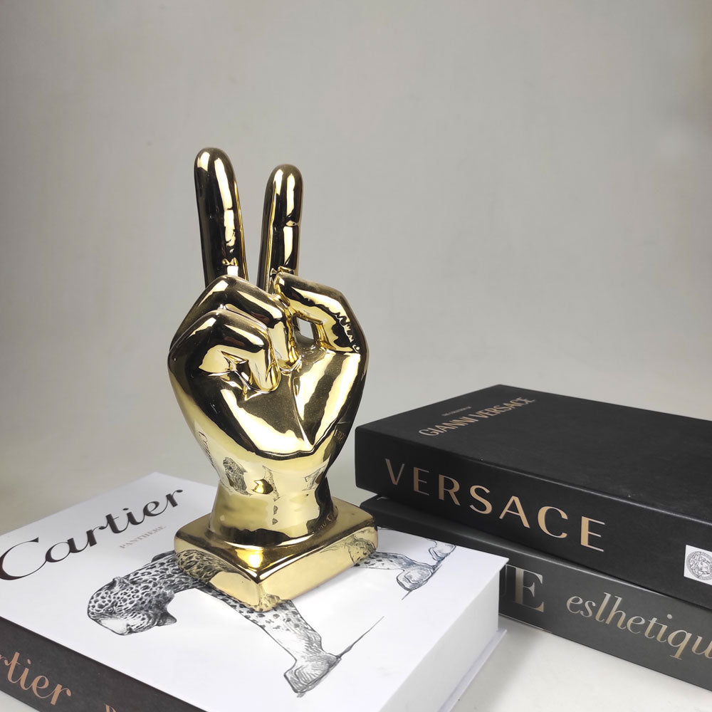Victory Ceramic crafted golden thumbs  as creative ornaments