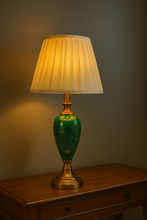 Load image into Gallery viewer, Elegant green ceramic vintage table lamp with pleated shade on wooden console
