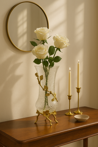 Crackle glass vase on antique gold vine stand used as a luxury table centerpiece