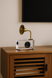 Vintage-inspired acrylic gramophone showpiece with gold horn on a wooden console