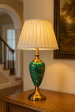 Load image into Gallery viewer, Elegant green ceramic vintage table lamp with pleated shade on wooden console
