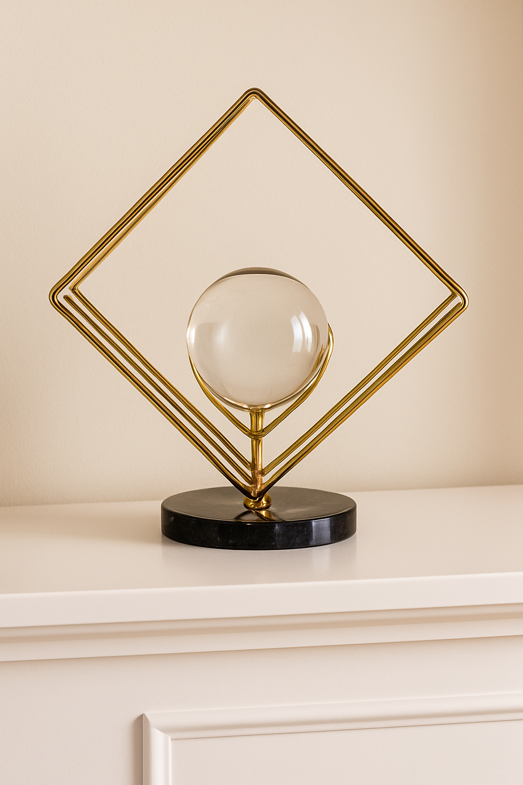 Gold geometric diamond frame decor with crystal orb on black base – MetaphorBD modern table sculpture