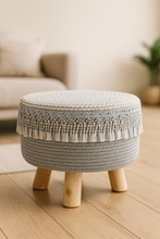 Load image into Gallery viewer, Nordic boho woven stool with tassel fringe and wooden legs – MetaphorBD home décor seating
