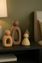 Load image into Gallery viewer, Modern abstract family figurine set in matte earthy tones – MetaphorBD home decor

