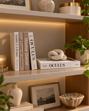 Load image into Gallery viewer, 4 piece white beige decorative fake books stacked on luxury marble coffee table with knot sculpture
