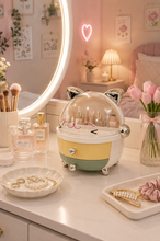 Load image into Gallery viewer, Cute cat-shaped makeup and jewellery organizer with transparent dust cover and two storage drawers, measuring 10 inches high, 10 inches wide and 9 inches deep.

