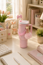 Load image into Gallery viewer, White Pookie bow 1L tumbler with straw, handle and pom-pom charm on office desk – MetaphorBD
