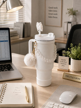 Load image into Gallery viewer, Blue Pookie bow 1L tumbler with straw, handle and pom-pom charm on study desk – MetaphorBD
