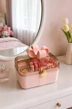 Load image into Gallery viewer, Bow Belle white portable makeup organizer open on marble dressing table with jewellery and perfume – MetaphorBD
