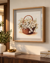 Load image into Gallery viewer, Daisy Basket floral wall art with white daisies in a woven basket and a natural-look wooden frame.
