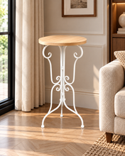 Load image into Gallery viewer, 26 inch tall Nordic accent table with 12 inch round natural wooden top and elegant white metal scrollwork frame – MetaphorBD
