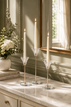 Load image into Gallery viewer, Diamond Glow 3-piece crystal candle holder set with rose-gold stems on marble console with mirror
