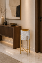 Load image into Gallery viewer, Luxury white embossed metal planter with gold interior and gold metal stand for indoor home décor.
