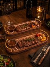 Load image into Gallery viewer, Luxury wooden steak serving tray with gold handles on elegant dining table setup
