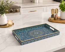 Load image into Gallery viewer, Mediterranean decorative serving tray with blue ornamental pattern and gold handles on marble kitchen counter
