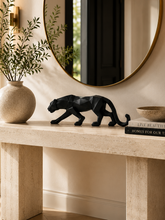 Load image into Gallery viewer, Modern black geometric panther resin sculpture for luxury home and office decor displayed on a console table.
