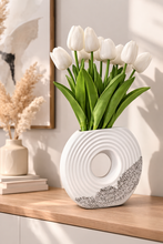 Load image into Gallery viewer, Modern white textured ceramic donut vase with sculptural minimalist design
