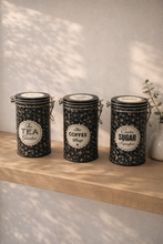 Load image into Gallery viewer, Vintage black floral kitchen storage jar set for tea coffee sugar with clamp lids
