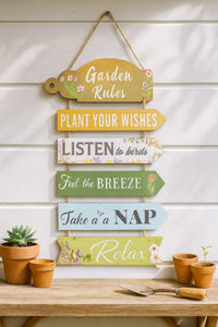 Rustic wooden wall hanging with Bless, Food, Family, Love, Amen typography
